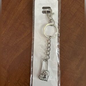 NWT Attachable keychain like tag for your bag or luggage or purse.